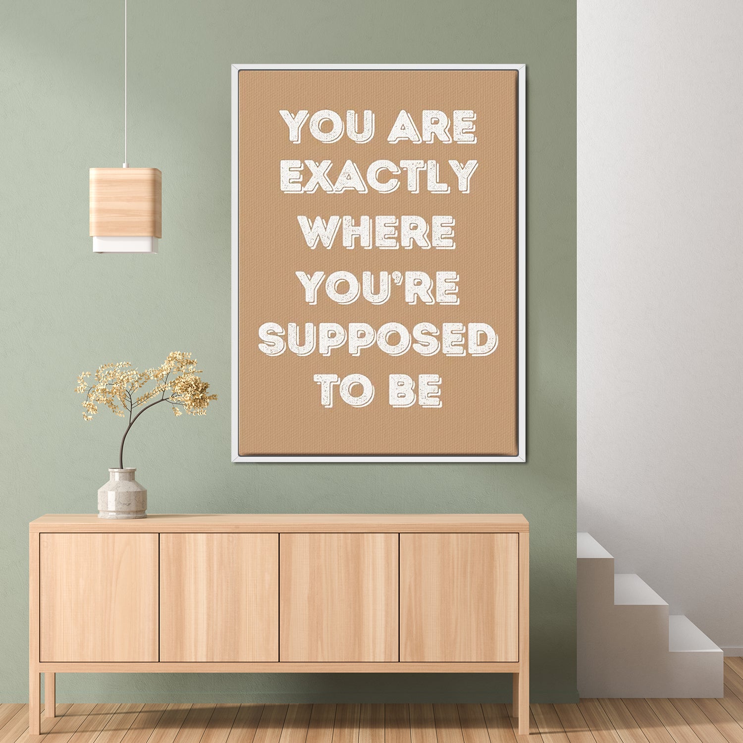 white frame motivational poster canvas print hanging on the wall