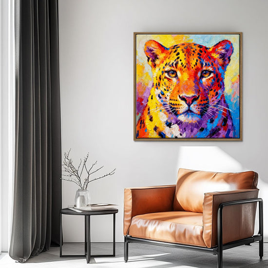 light oak color frame wall art canvas painting depicts a vibrantly colored leopard.