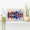 wall art canvas painting on the table depicts city skylines