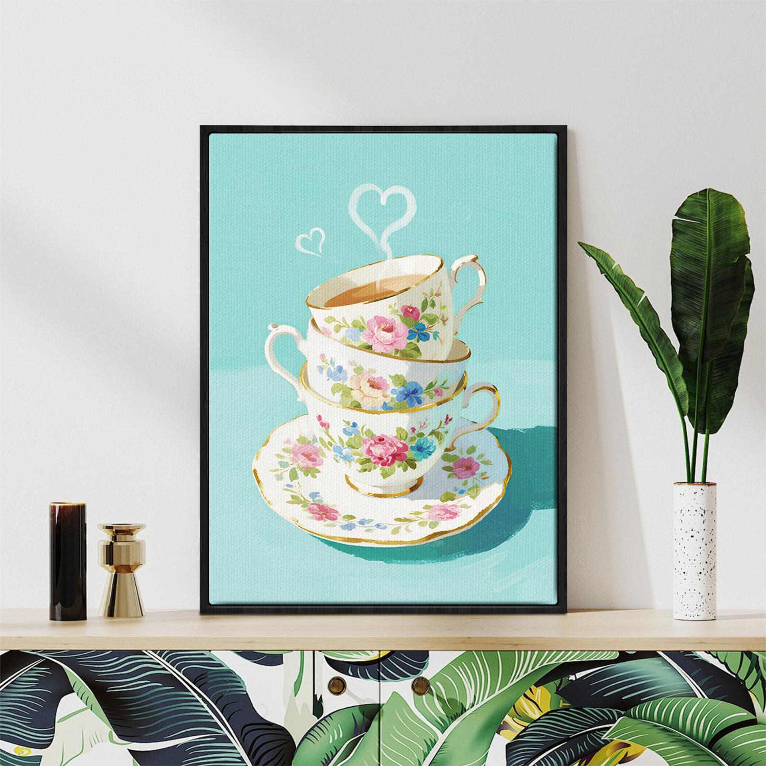 black frame wall art canvas painting depicts stacked floral teacups