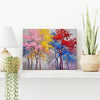 wall art painting on the table depicting colorful forest