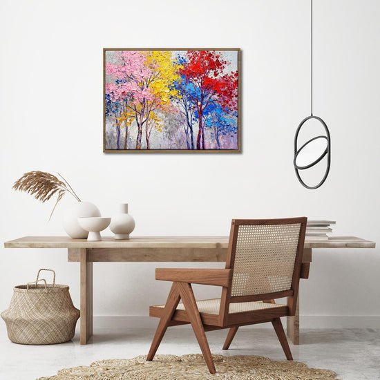 light oak color frame wall art painting depicting colorful forest