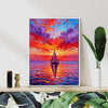 white frame wall art painting depicts the beautiful scenery of a sailboat sailing on the sea dyed by the gorgeous sunset.